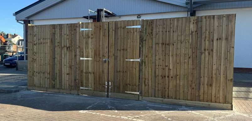 Timber Fencing storage area in car parking area